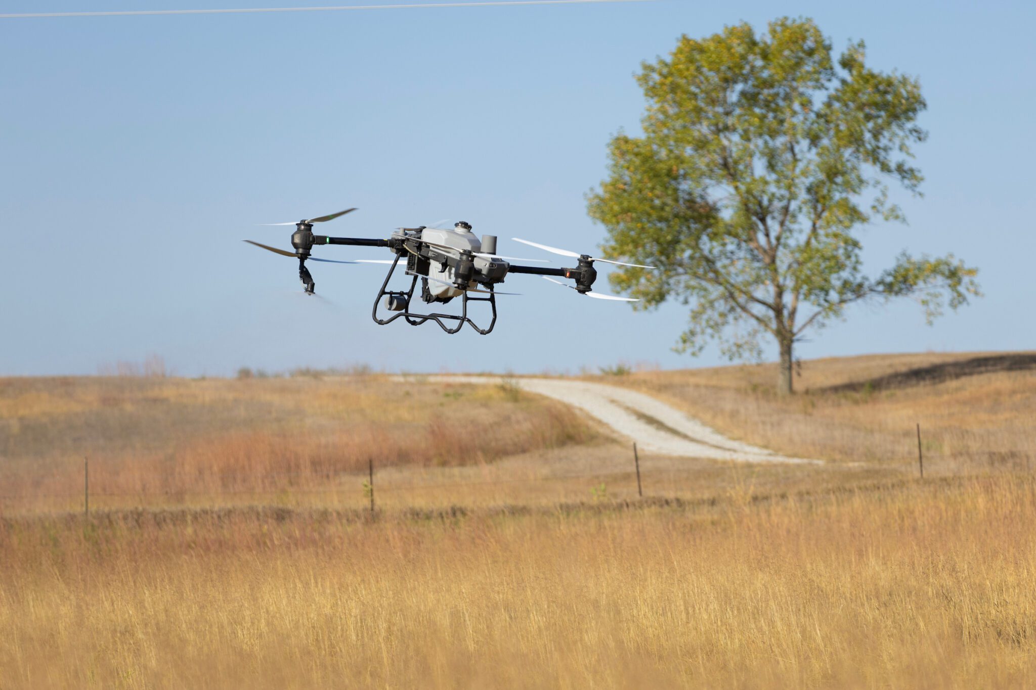 UNO alumni Sawyer Buller and his business partner, Alex Smith, started a business called Husker Drone Spraying Services based in Ashland, Nebraska. They are seen here flying a drone on Friday, Oct. 4, 2024, near Ashland. Buller graduated from UNO’s Aviation Institute’s drone program.